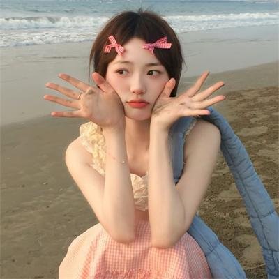 桃花含露又春风